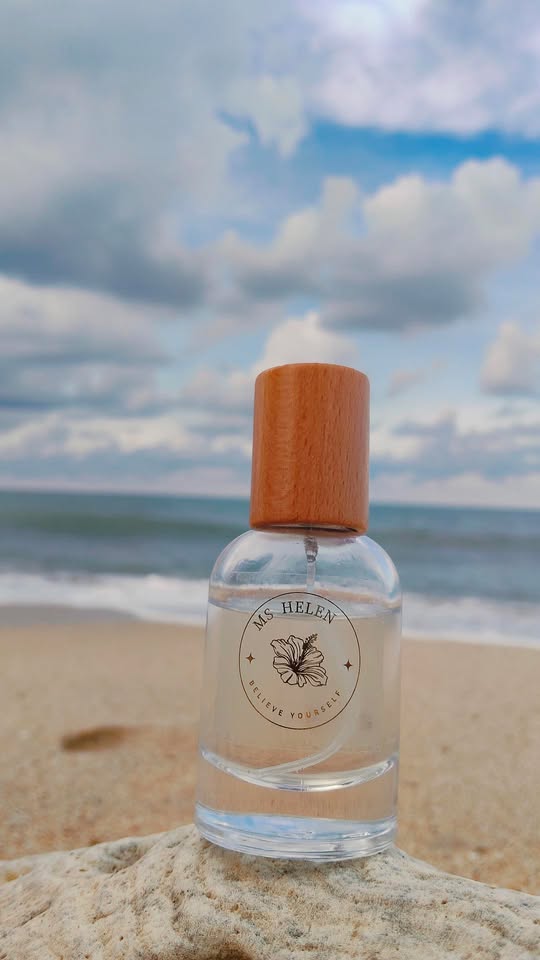 Be Yourself eau de parfum on the sand at the beach